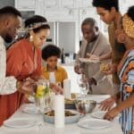 Family Setting the Table for Dinner