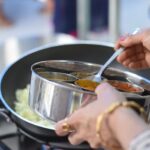 A Woman Cooking Indian Food