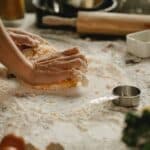 Cook making homemade dough for pie in cafe