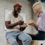 Man And Woman Eating Together