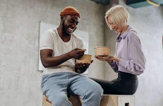 Man And Woman Eating Together