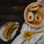 Sliced Banana on Brown Wooden Round Plate