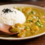 Cooked Rice and Curry Food Served on White Plate