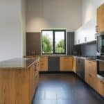 Interior of modern kitchen with wooden furniture