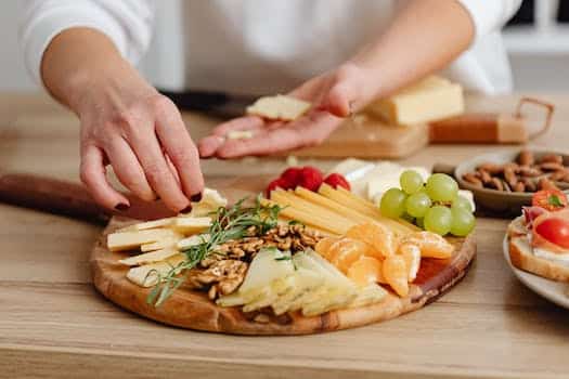 A Person Preparing a Charcuterie Board