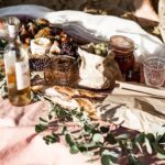 Labeled Glass Bottle Beside Food