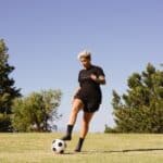 Photo Of Person Playing Soccer On The Field