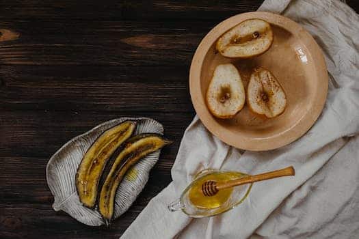 Sliced Banana on Brown Wooden Round Plate