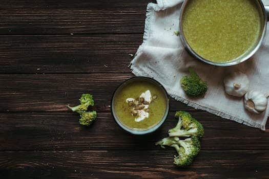 Green Broccoli and White Rice on White Ceramic Bowl