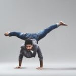 Man Performing Handstand