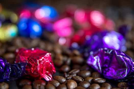 Pink And Purple Wrapped Candies In Close-up View